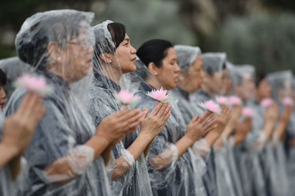 Bathing the Buddha in a Blessed Shower of “Dharma Dew”!    
